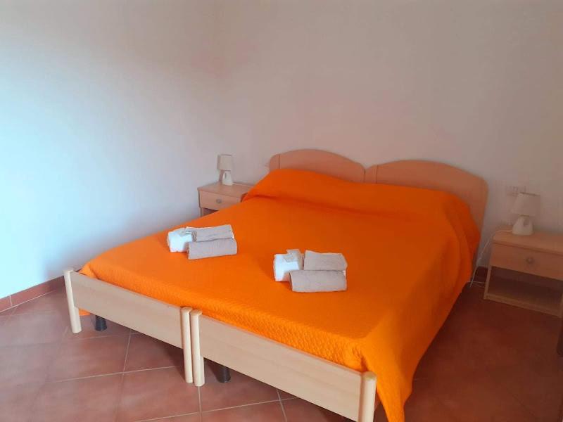 Ліжко або ліжка в номері Hotel Bena e Traes