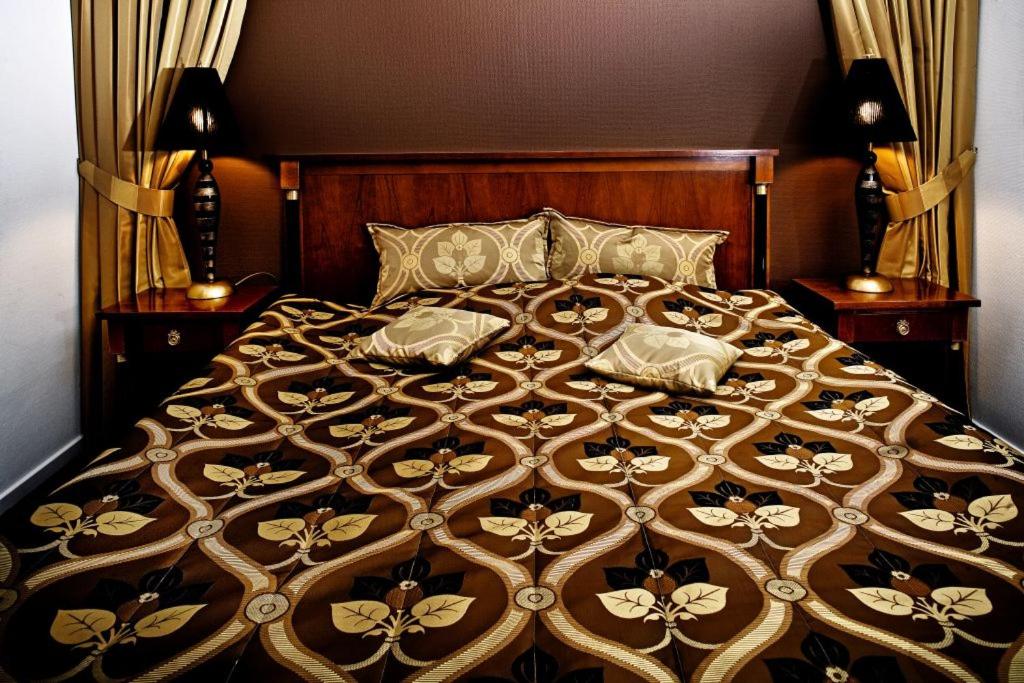 Postel nebo postele na pokoji v ubytování Hotel Tønderhus