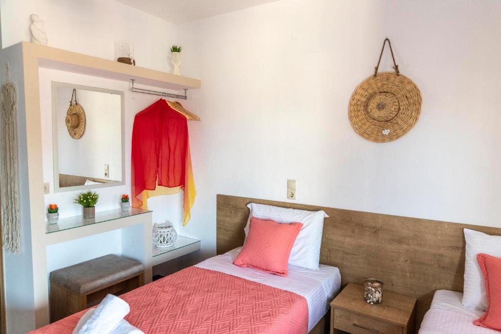 Postel nebo postele na pokoji v ubytování Stelios Apartment