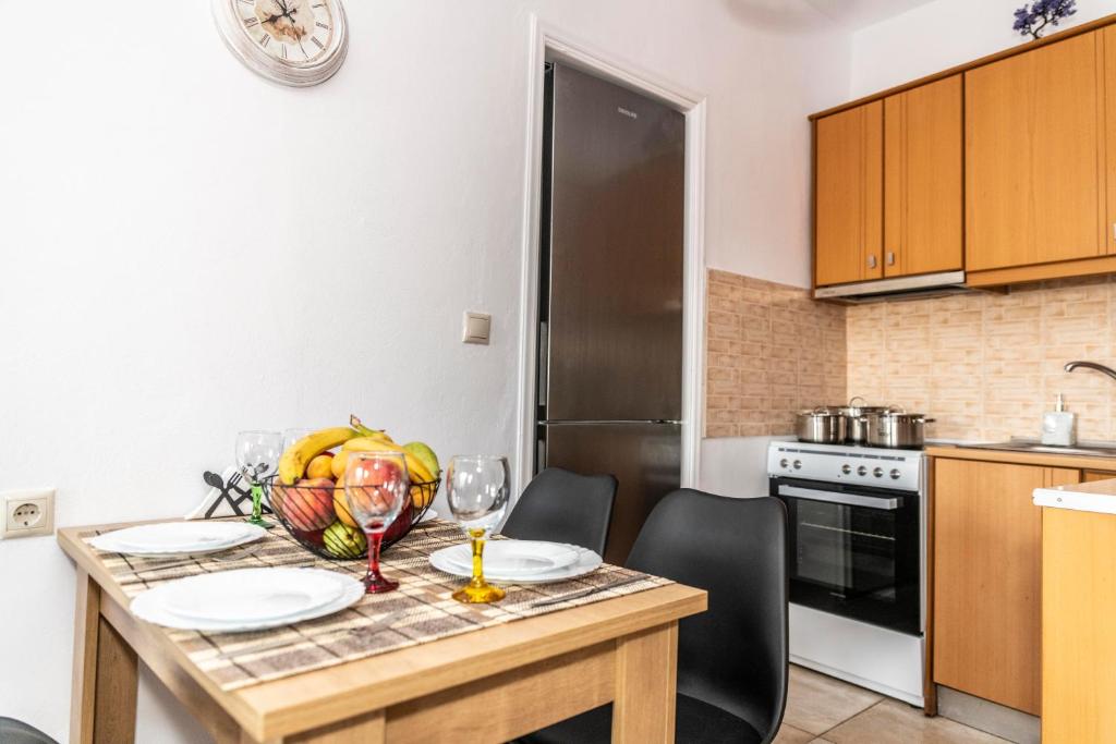 Kuchyň nebo kuchyňský kout v ubytování Stelios Apartment