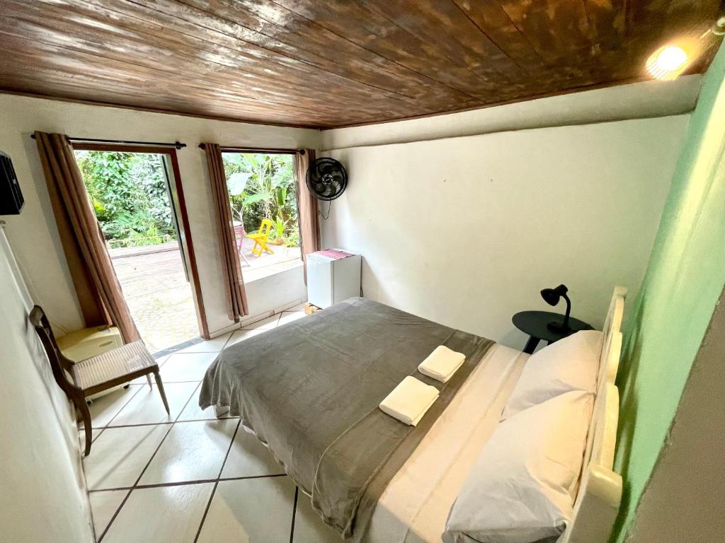Cama ou camas em um quarto em Casa Selva - Vila do Abraão - Ilha grande