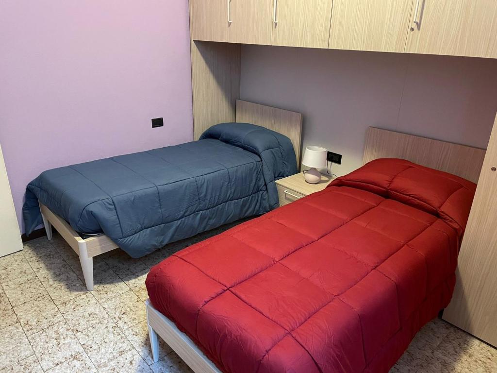 Postel nebo postele na pokoji v ubytování Casa vacanze da Carla