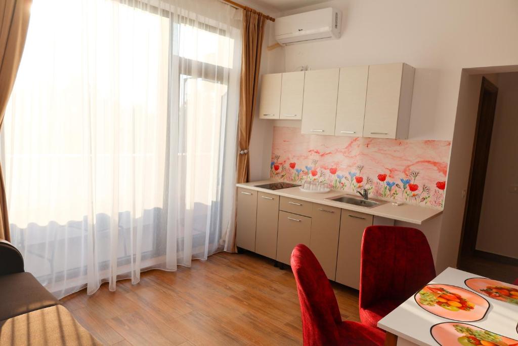 Kuchyň nebo kuchyňský kout v ubytování Summer Rest