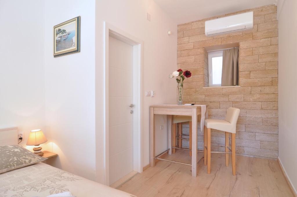 Postel nebo postele na pokoji v ubytování Rooms Palma