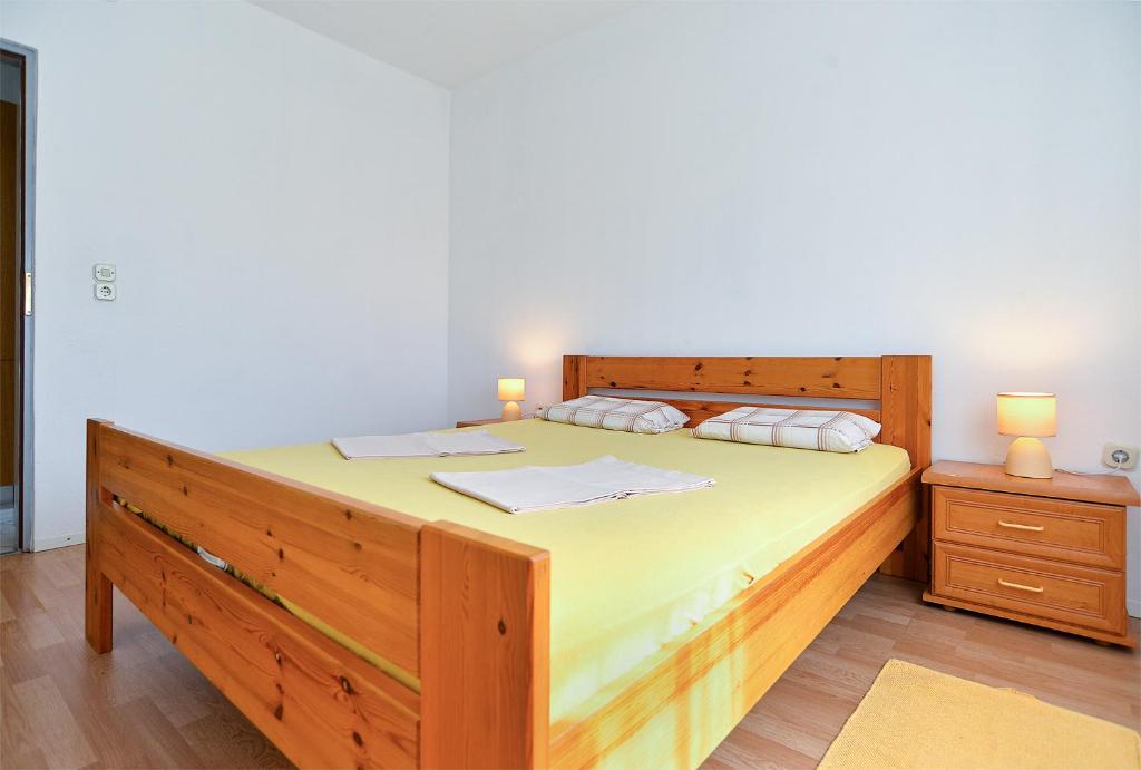 Postel nebo postele na pokoji v ubytování Apartments Stefko 2071