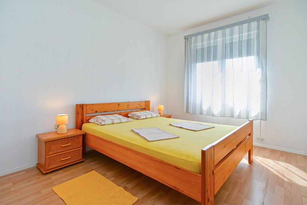 Postel nebo postele na pokoji v ubytování Apartments Stefko 2071