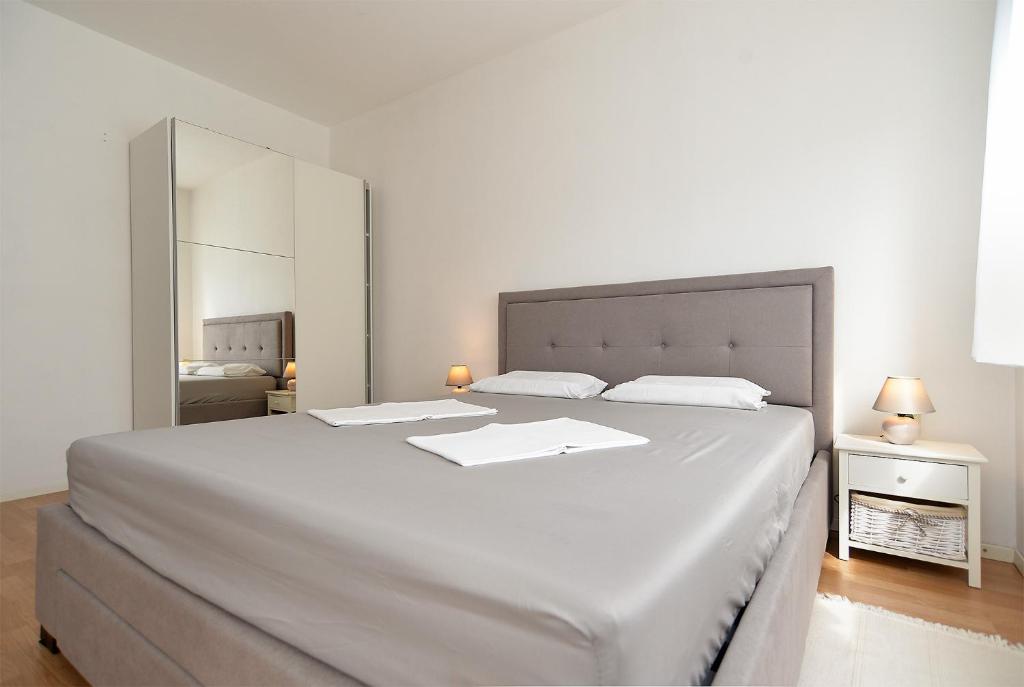 Postel nebo postele na pokoji v ubytování Apartments Stefko 2071