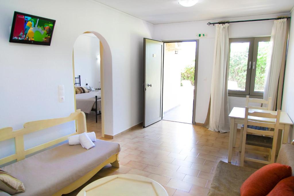 a living room with a couch and a table at Elpida Village in Istro