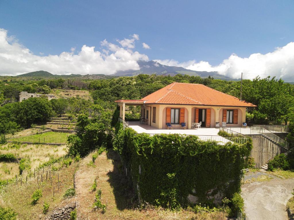 a house with a view of a vineyard at Le Vigne - Villa overlooking Etna in Adrano