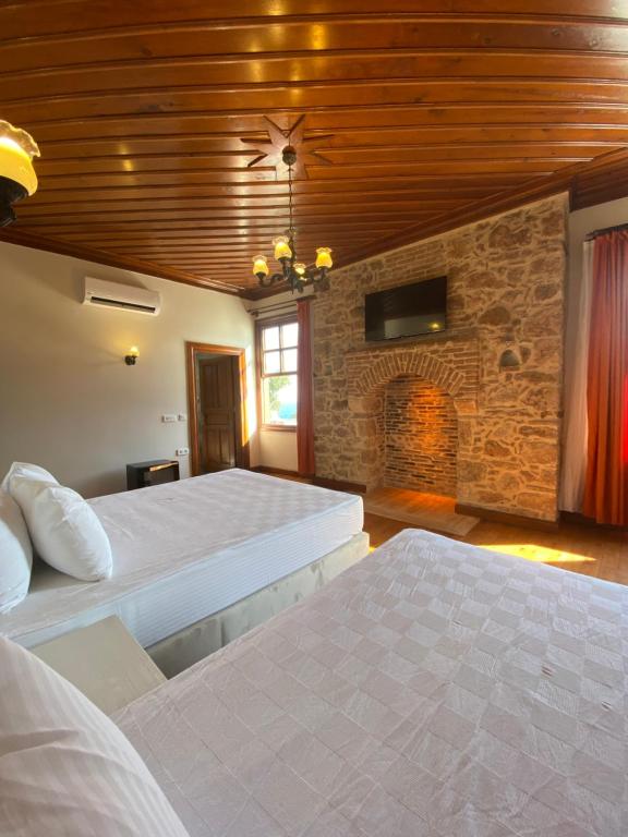 Postel nebo postele na pokoji v ubytování Ulivo Hotel
