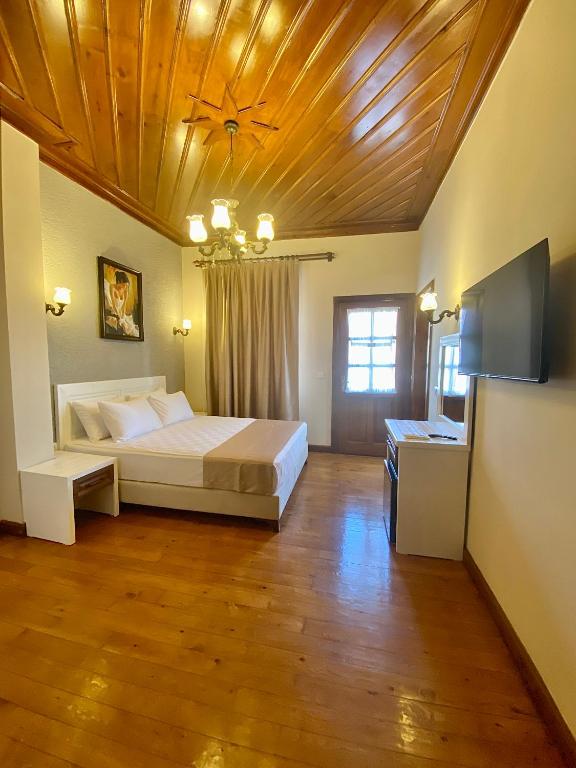 Postel nebo postele na pokoji v ubytování Ulivo Hotel