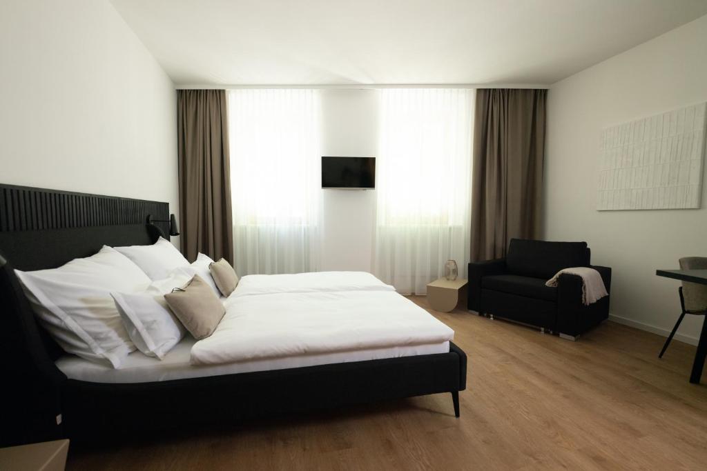 Postel nebo postele na pokoji v ubytování EDELHOF room
