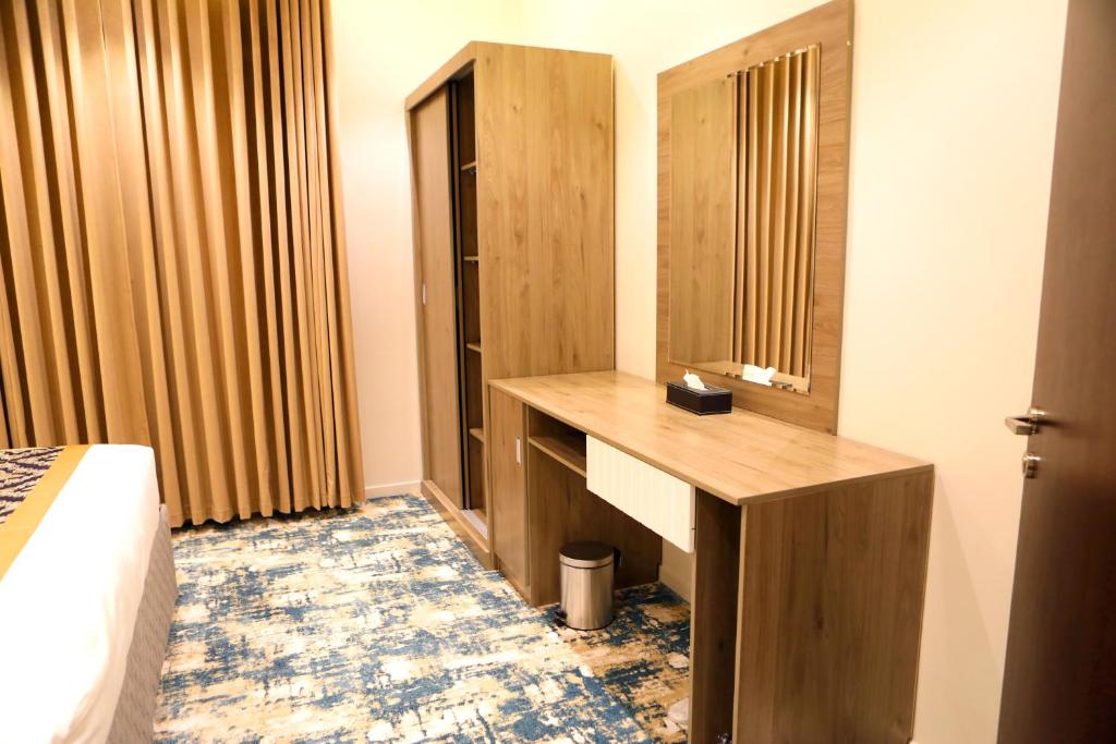 Postel nebo postele na pokoji v ubytování Oriens Hotel