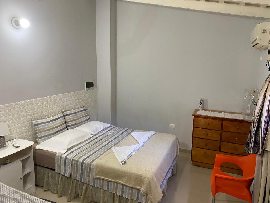 Postel nebo postele na pokoji v ubytování POSADA DON CANDIDO