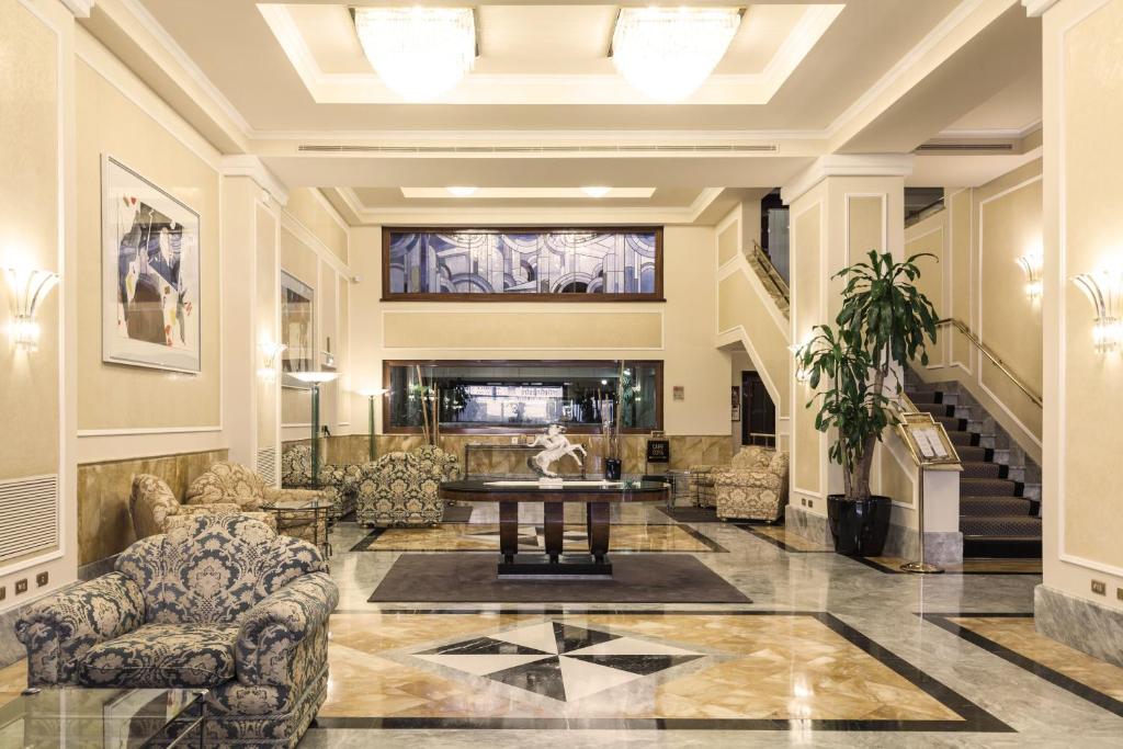 Posezení v ubytování Doria Grand Hotel