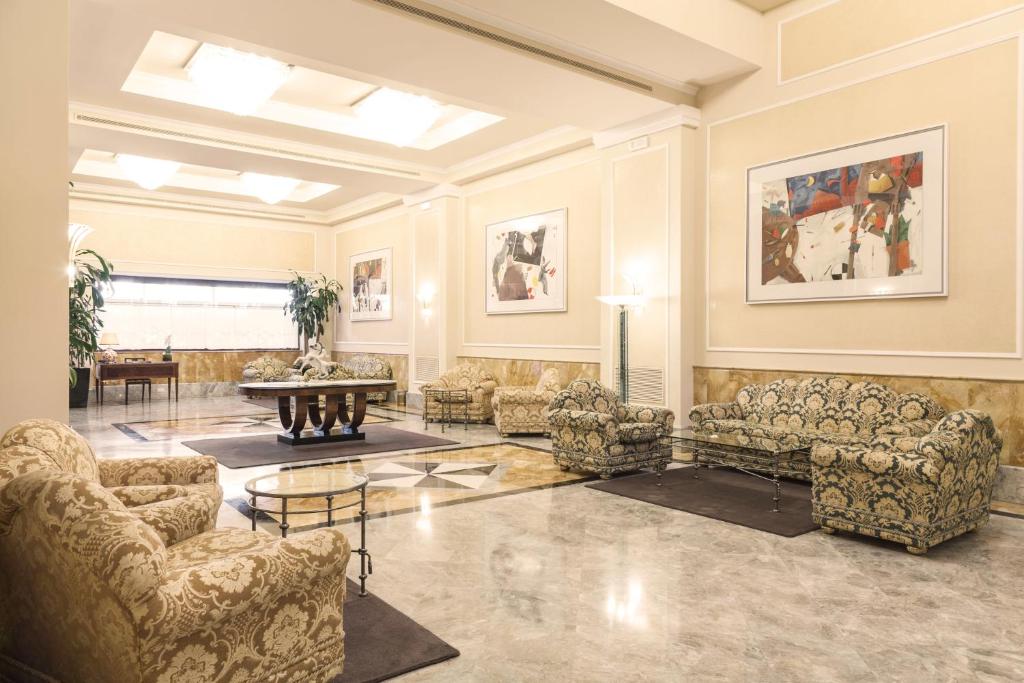 Posezení v ubytování Doria Grand Hotel
