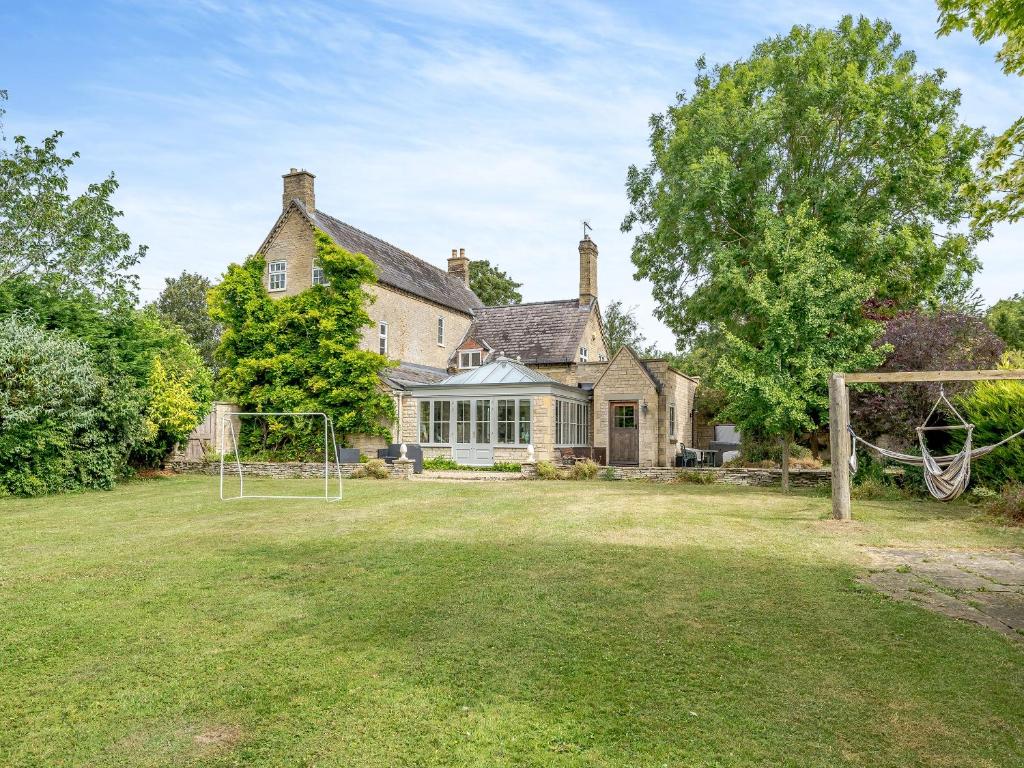 an exterior view of a house with a goal at The Glebe in Heckington