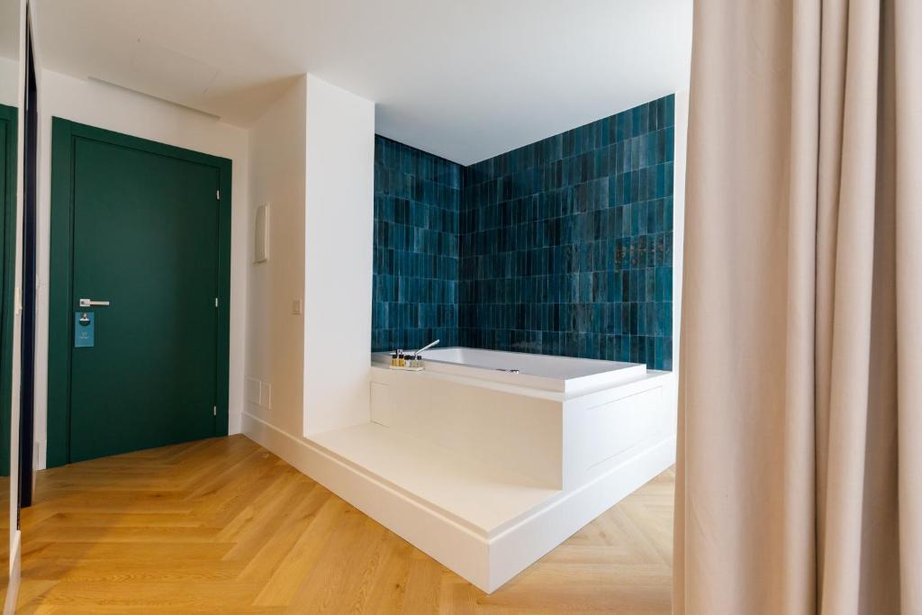 Postel nebo postele na pokoji v ubytování Grand Hotel Cesare Augusto