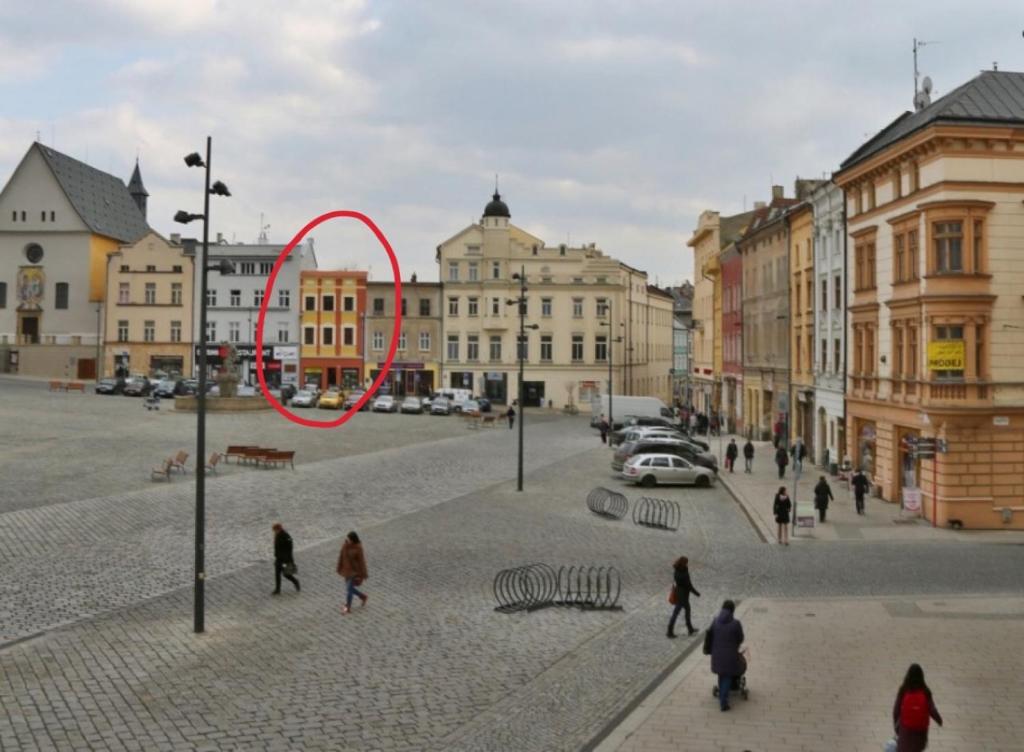 a red circle in the middle of a city street at Apartment Bessi in Olomouc