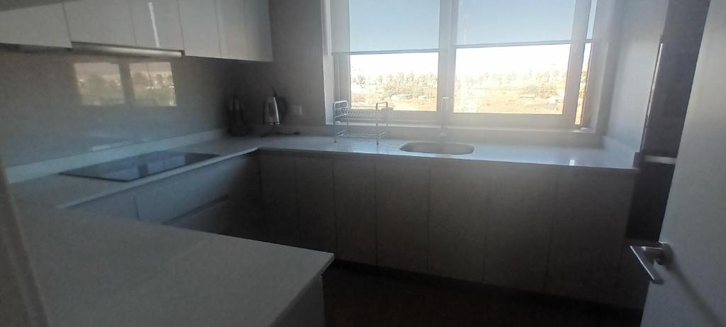 Η κουζίνα ή μικρή κουζίνα στο Departamento en Coquimbo