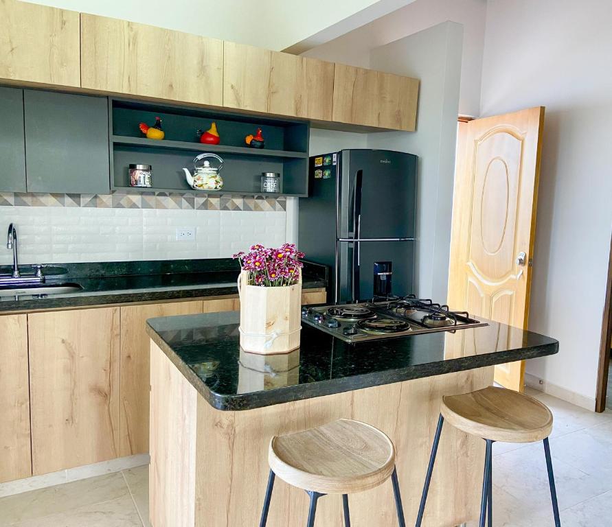 Kuchyň nebo kuchyňský kout v ubytování Cabañas con jacuzzi y chimenea - Casa Floral, Marinilla