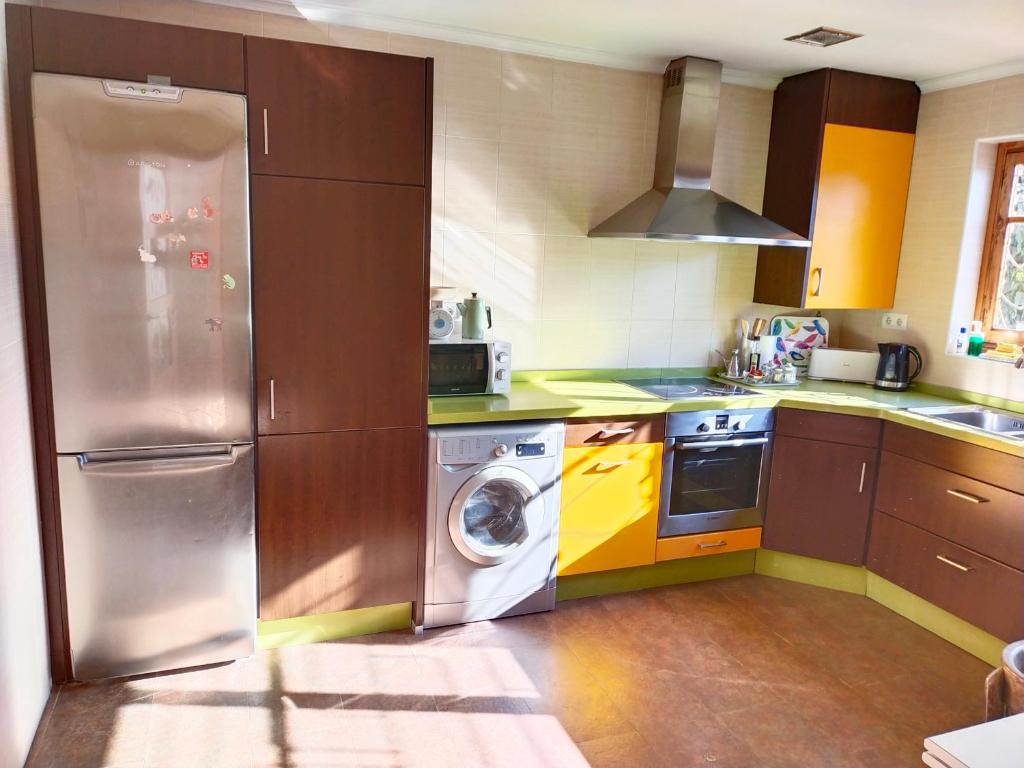Kuchyň nebo kuchyňský kout v ubytování Preciosa casa grande con patio en Sevilla 8PAX