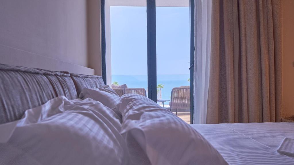 Postel nebo postele na pokoji v ubytování Azar Luxury Suites