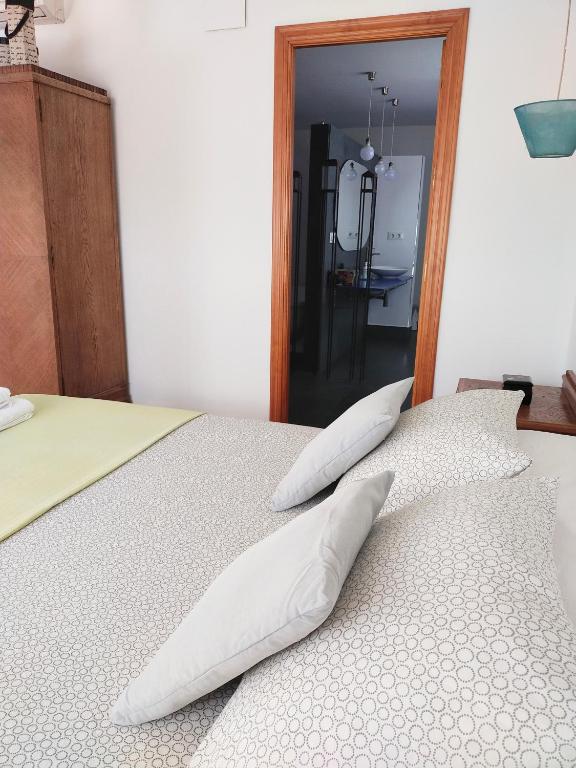Postel nebo postele na pokoji v ubytování Preciosa casa grande con patio en Sevilla 8PAX