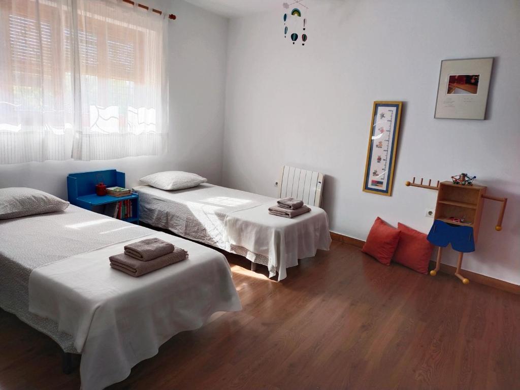 Postel nebo postele na pokoji v ubytování Preciosa casa grande con patio en Sevilla 8PAX