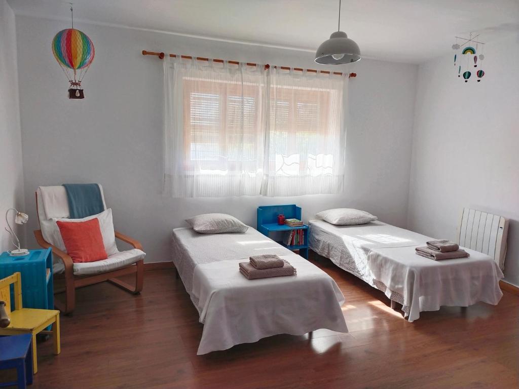 Postel nebo postele na pokoji v ubytování Preciosa casa grande con patio en Sevilla 8PAX
