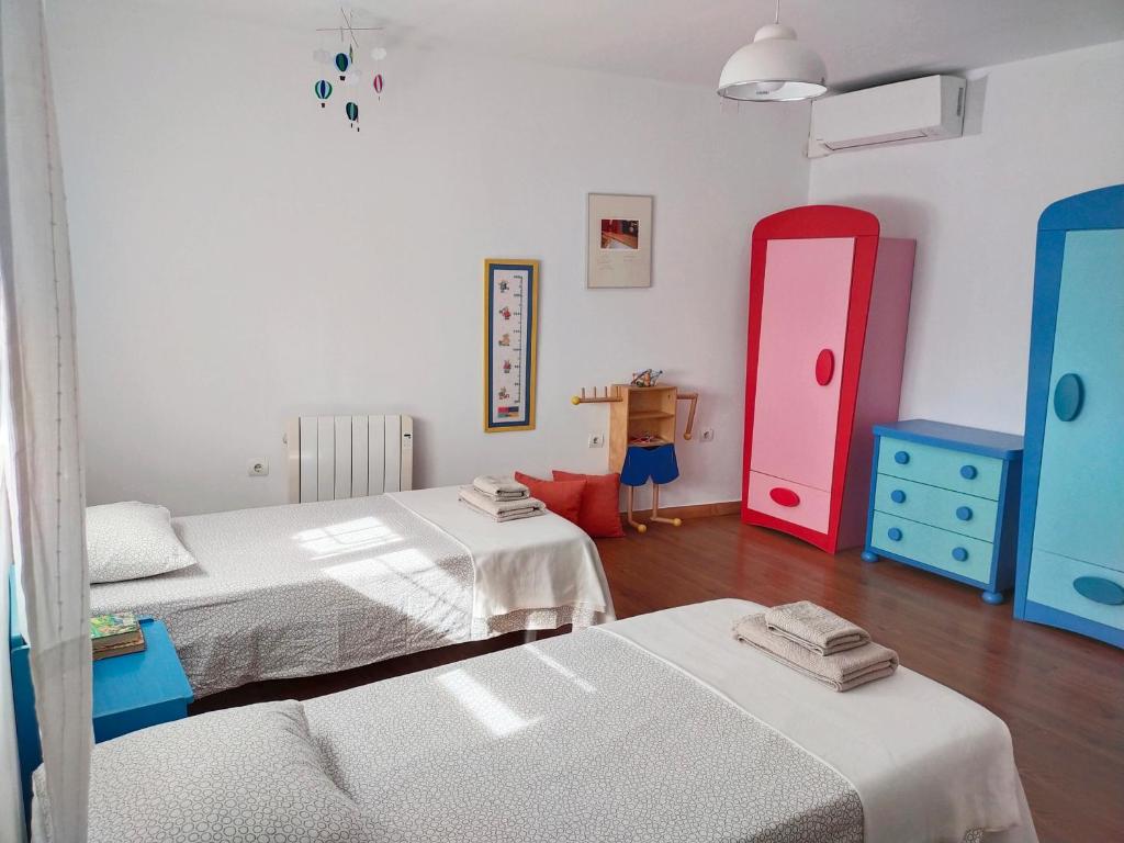 Postel nebo postele na pokoji v ubytování Preciosa casa grande con patio en Sevilla 8PAX