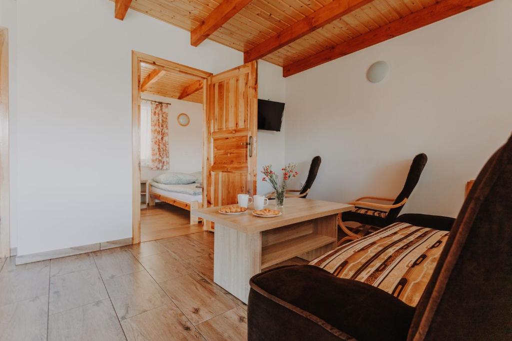 Postel nebo postele na pokoji v ubytování Domki Ania