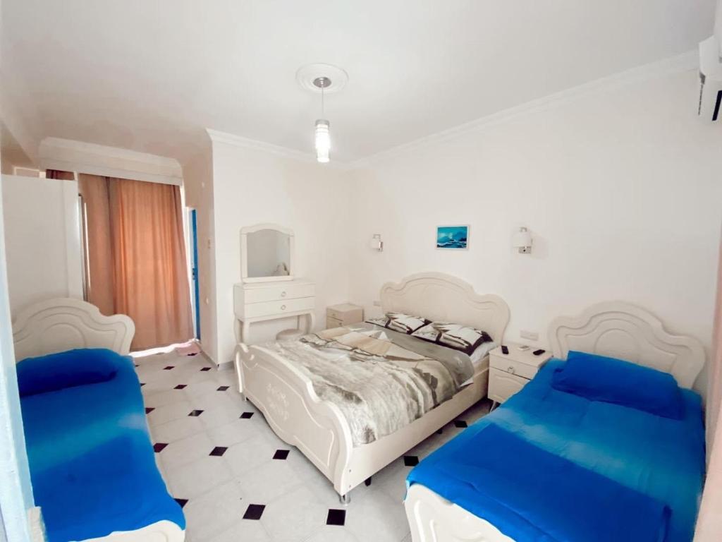 Postel nebo postele na pokoji v ubytování Hotel Tbiliselebi