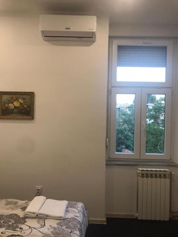 Posteľ alebo postele v izbe v ubytovaní TOMISLAV