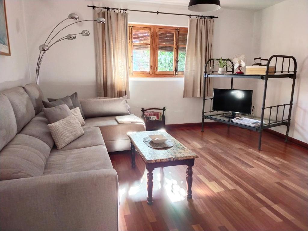 Posezení v ubytování Preciosa casa grande con patio en Sevilla 8PAX