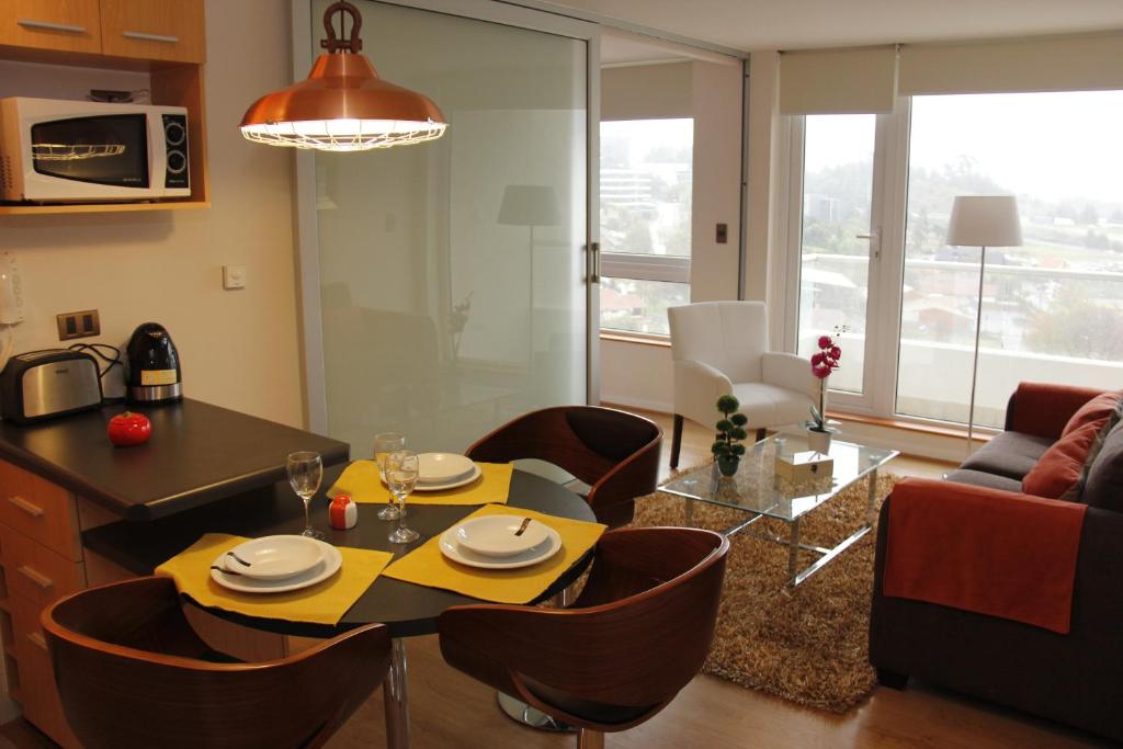 Kuchyň nebo kuchyňský kout v ubytování Concepción Suites