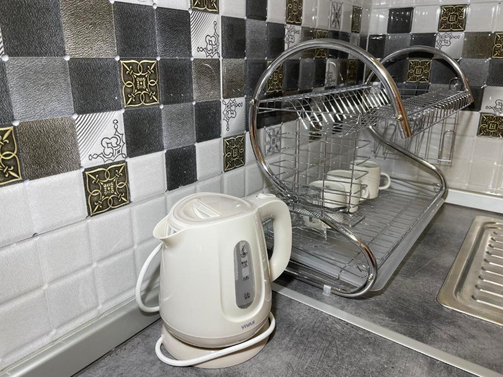 Kuchyň nebo kuchyňský kout v ubytování Bora Apartmani - FREE PARKING - CITY CENTER