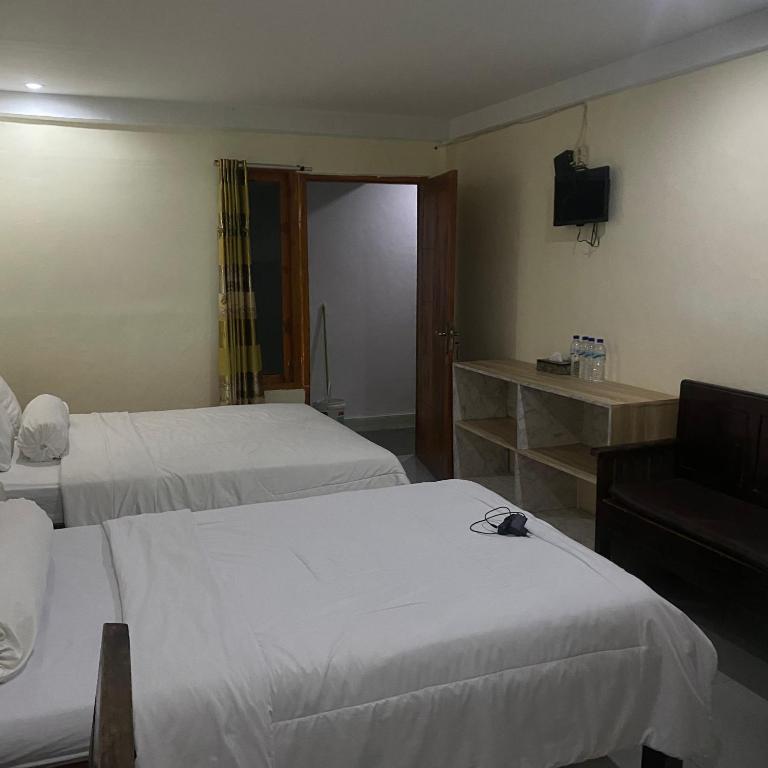 Postel nebo postele na pokoji v ubytování Pesona bali Room and restaurant