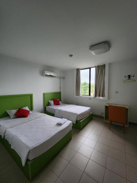 Postel nebo postele na pokoji v ubytování Y Hotel