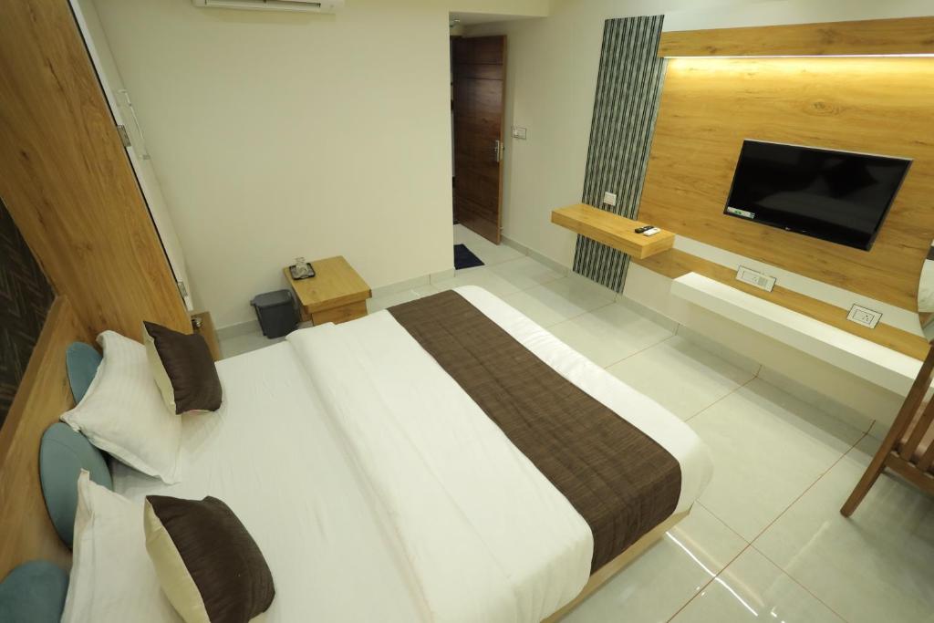 TV a/nebo společenská místnost v ubytování HOTEL RK FORTUNE