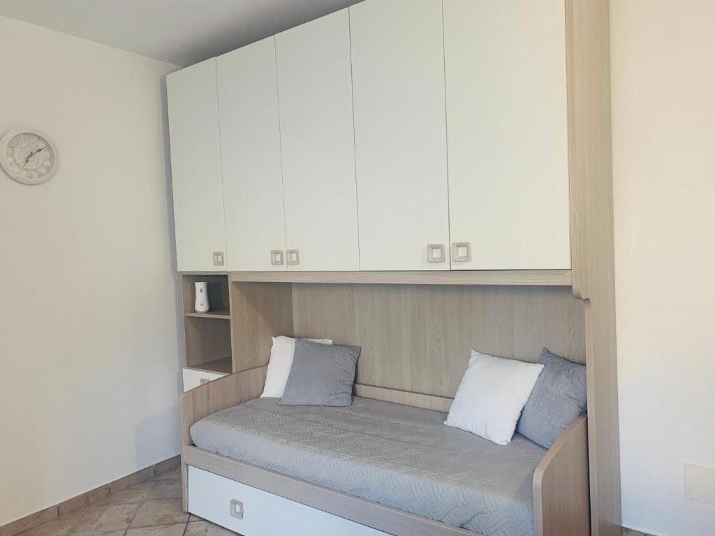 Postel nebo postele na pokoji v ubytování Il Cortiletto