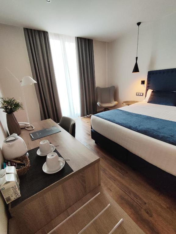 Posteľ alebo postele v izbe v ubytovaní Taverna de la Sal Boutique Hotel