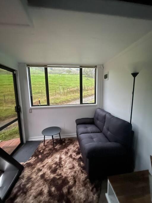Χώρος καθιστικού στο Tiny home in the hills Ruapehu