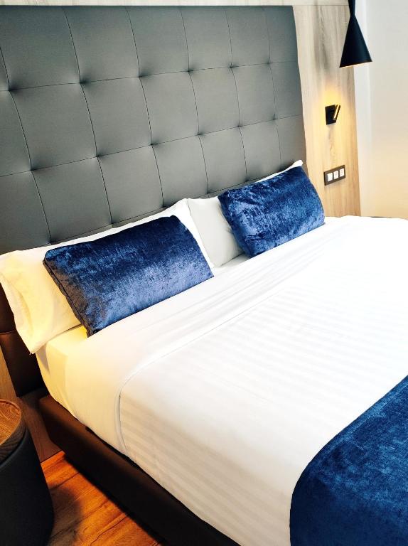 Posteľ alebo postele v izbe v ubytovaní Taverna de la Sal Boutique Hotel