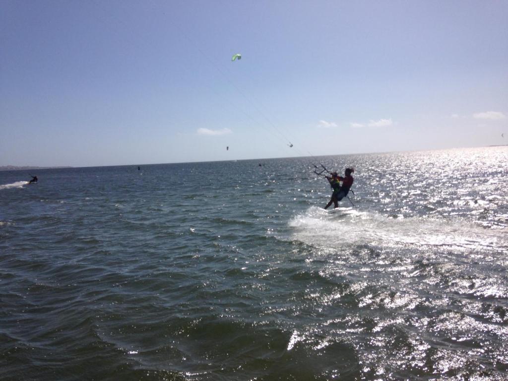 a person is water skiing in the ocean at Al Vecchio Pontile Vista Mare in Marsala