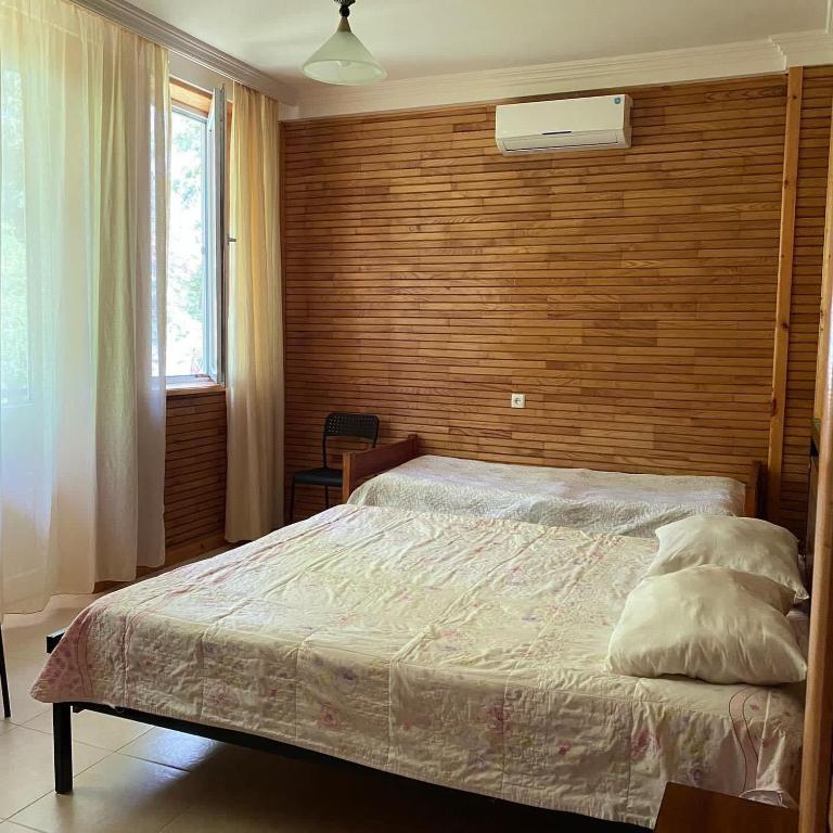 Postel nebo postele na pokoji v ubytování Guest house Shekvetili