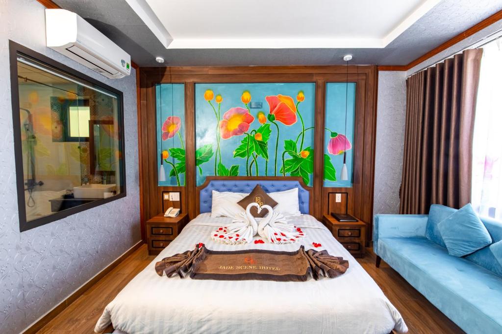 Postel nebo postele na pokoji v ubytování Jade Scene Hotel