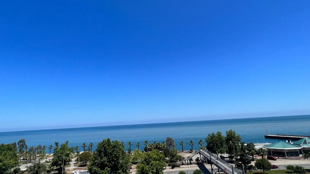 a view of the ocean from a resort at TOPCU HOME in Akcaabat