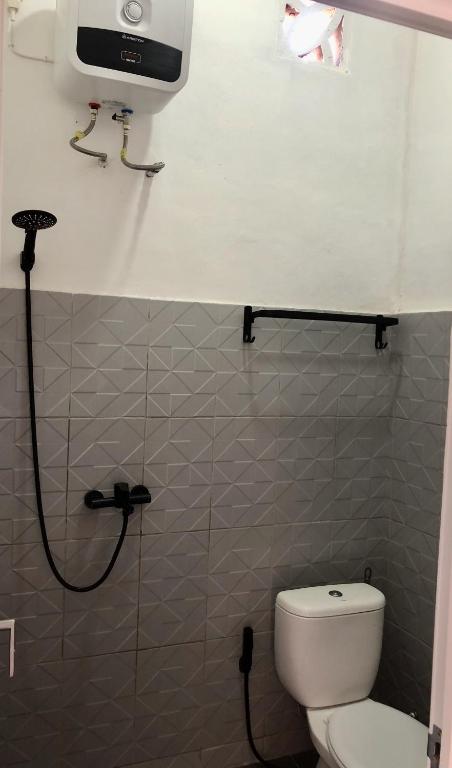 Koupelna v ubytování LOPE HOMESTAY