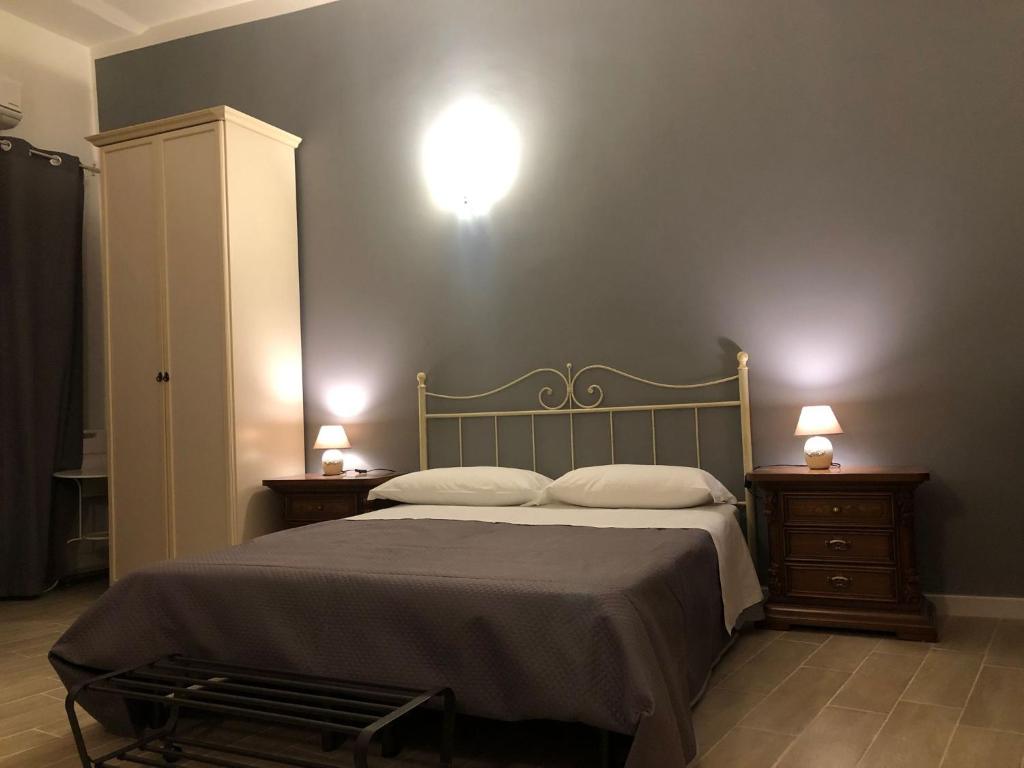 Postel nebo postele na pokoji v ubytování Kalé Atenea
